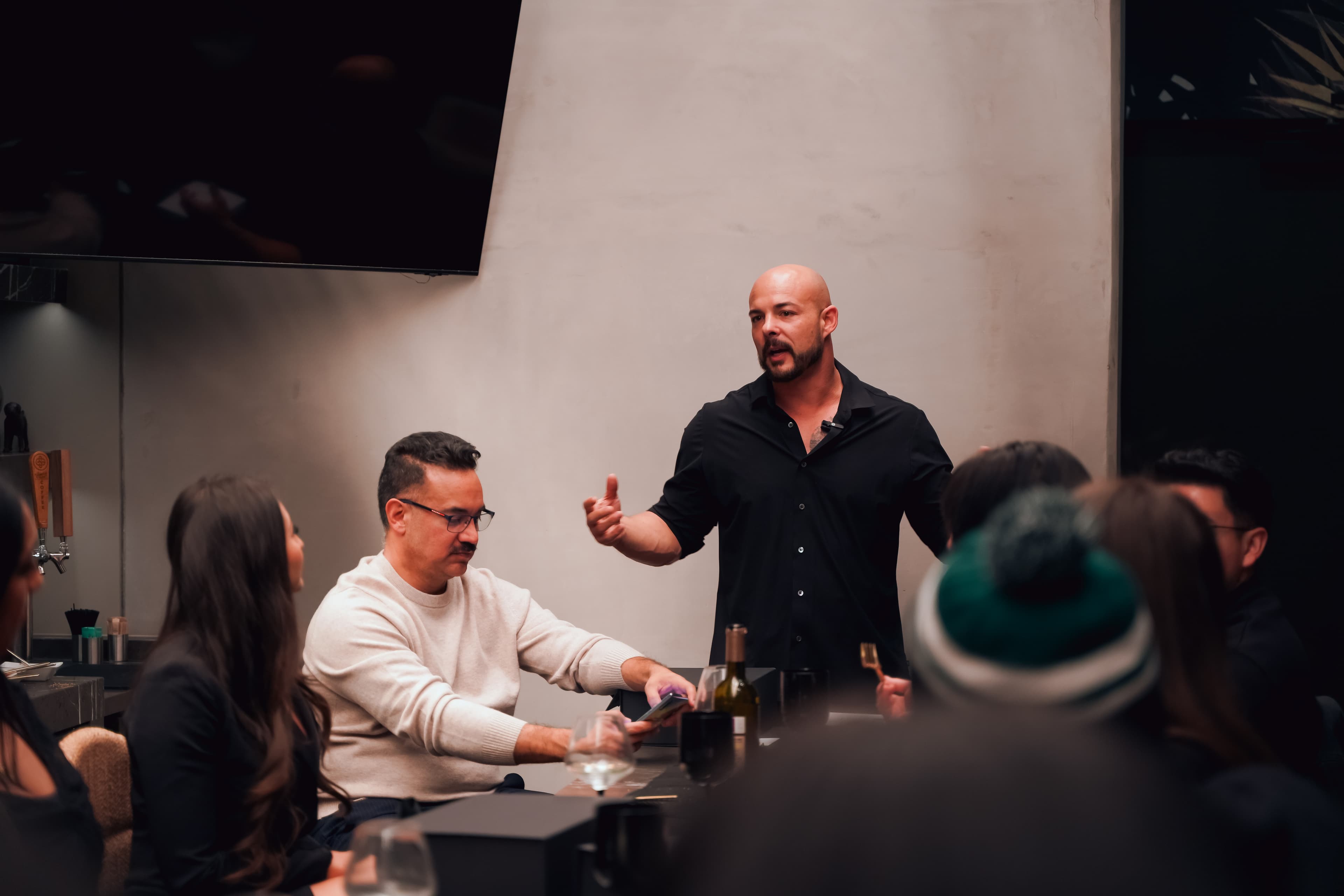 Garin Heslop leading an intimate founders' table dinner