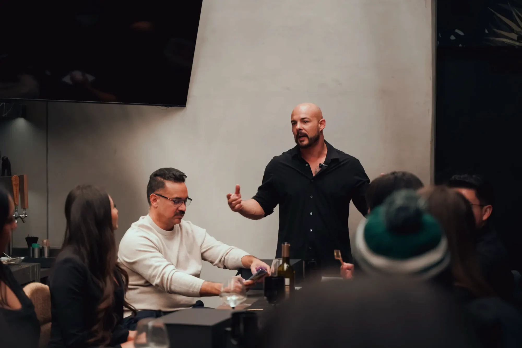 Garin leading a conversation at the founders table